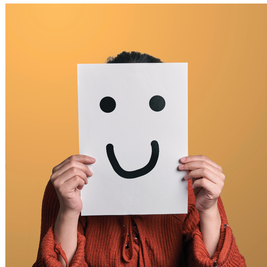 person with smiling mask, showing toxic positivity 