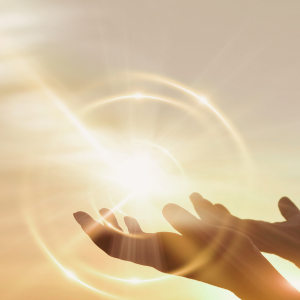 Hands reaching sky with halo representing Mind, Body, Spirit approach by Holistic Mental Health Counseling orlando, fl